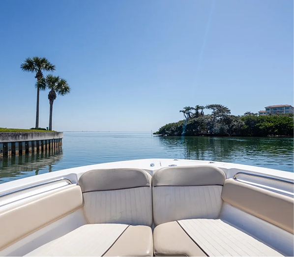 A boat with two seats on the back of it.