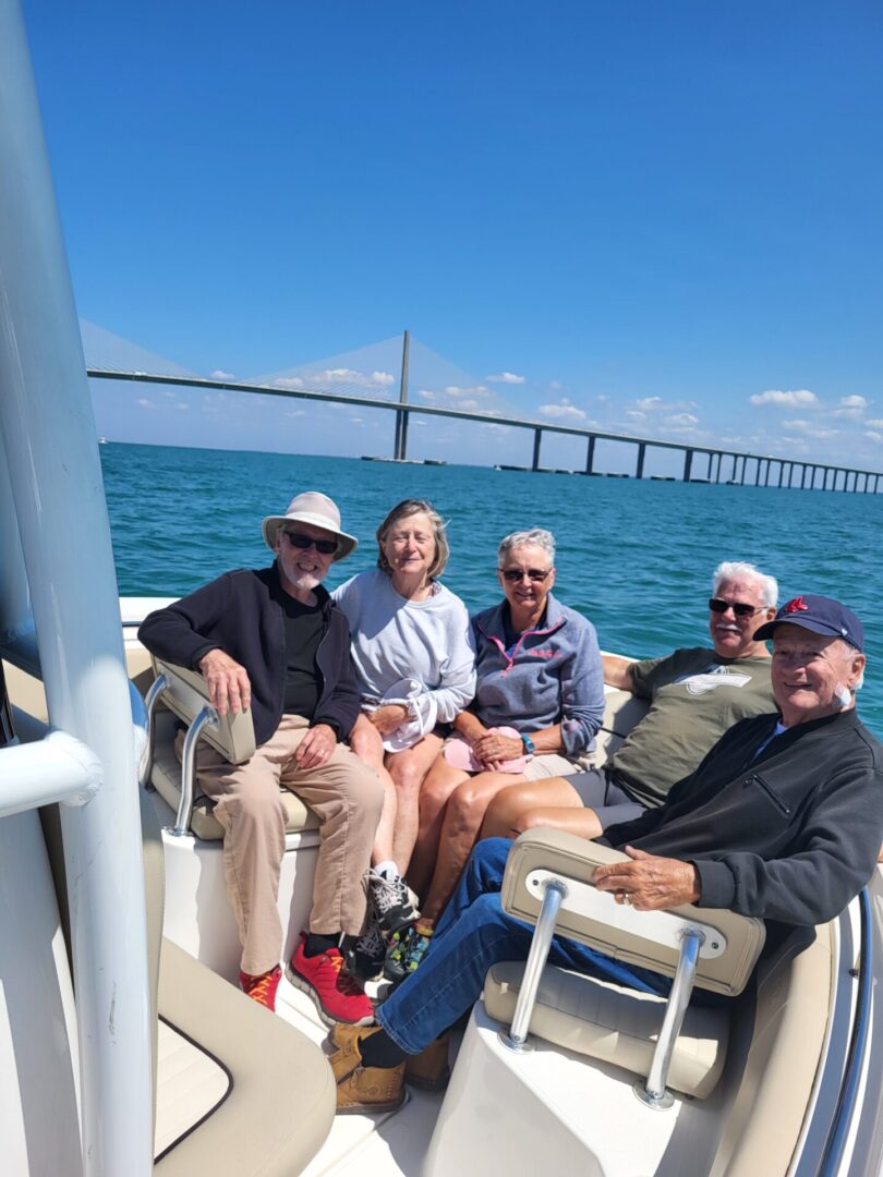 A group of people sitting on a boat