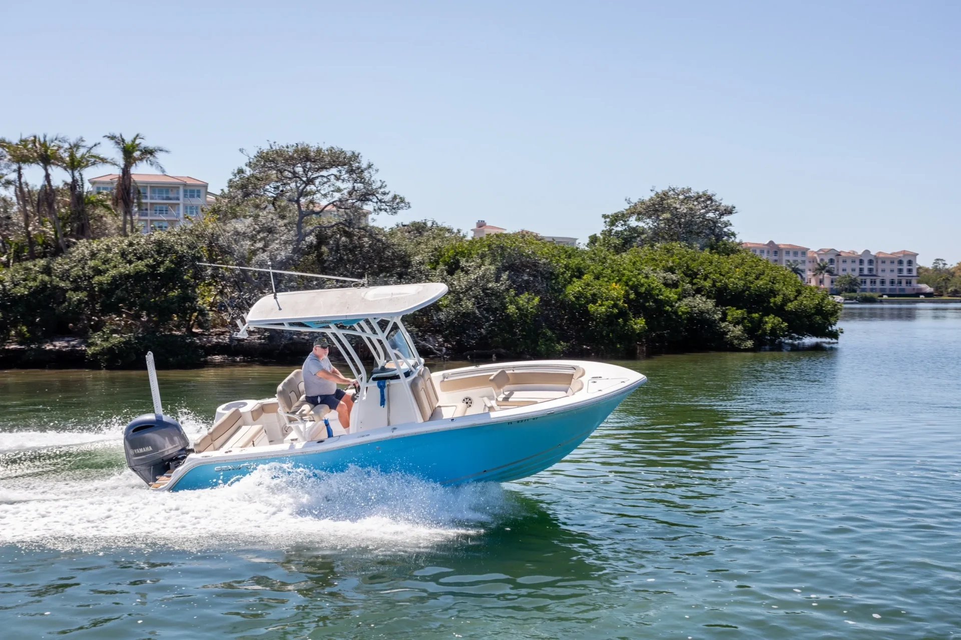 A boat is traveling down the water.