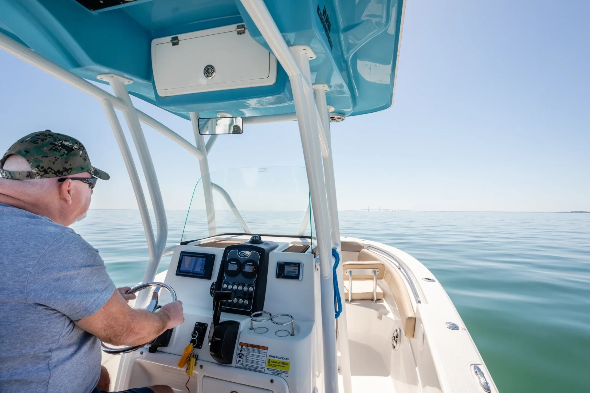 A person on the boat in the water.