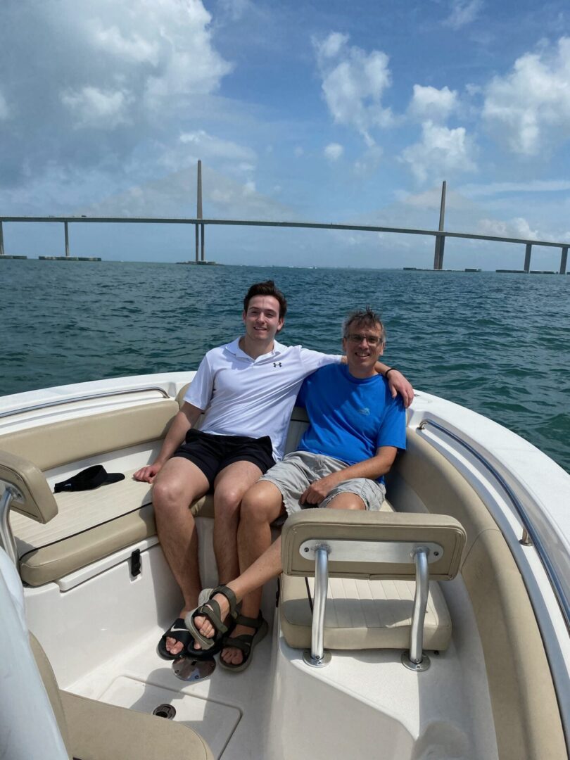 Two people sitting on a boat