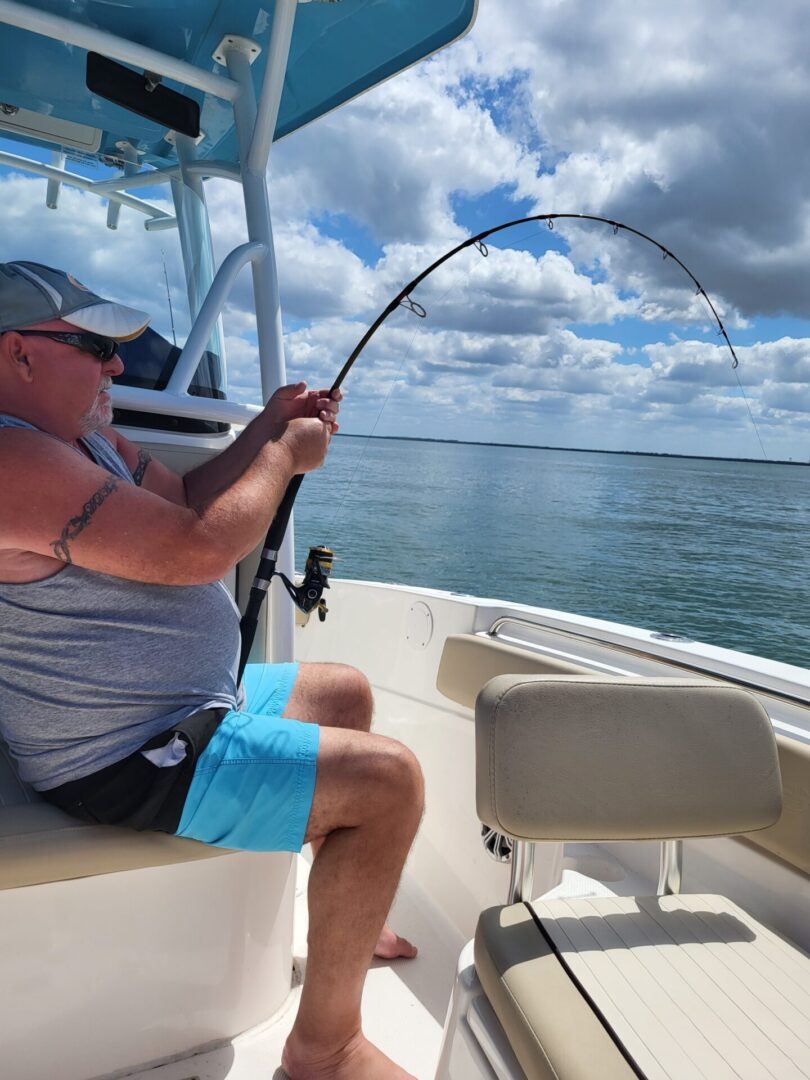 A man fishing on a boat